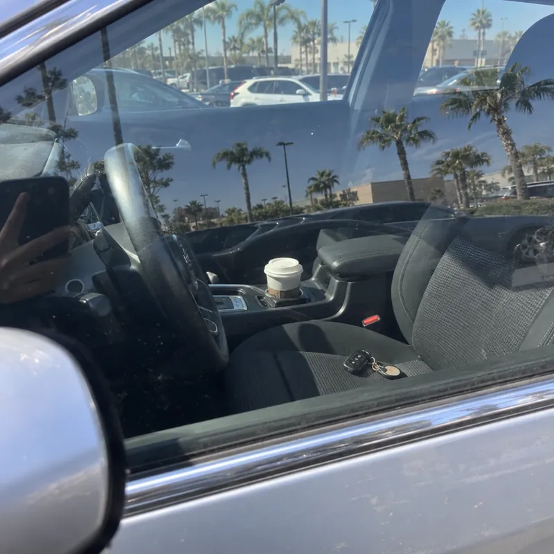 Car keys left on the seat of a locked car